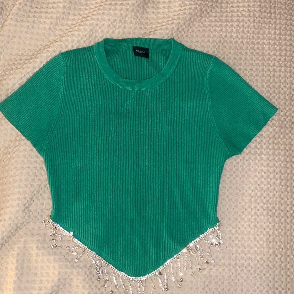 Top, like new. Size large . This top runs small and it fit me well.